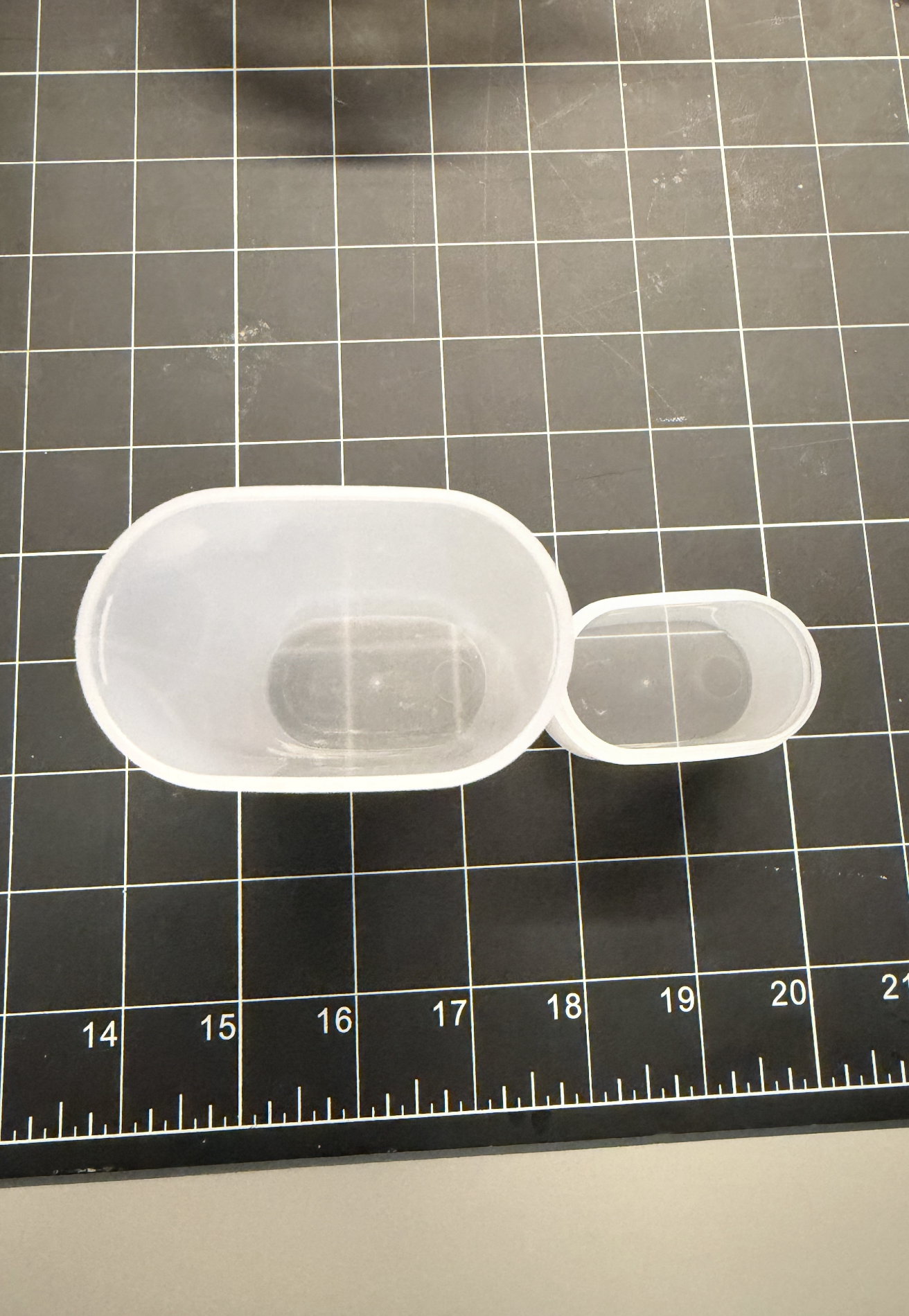 Frosted pen case with the cap off, top view.