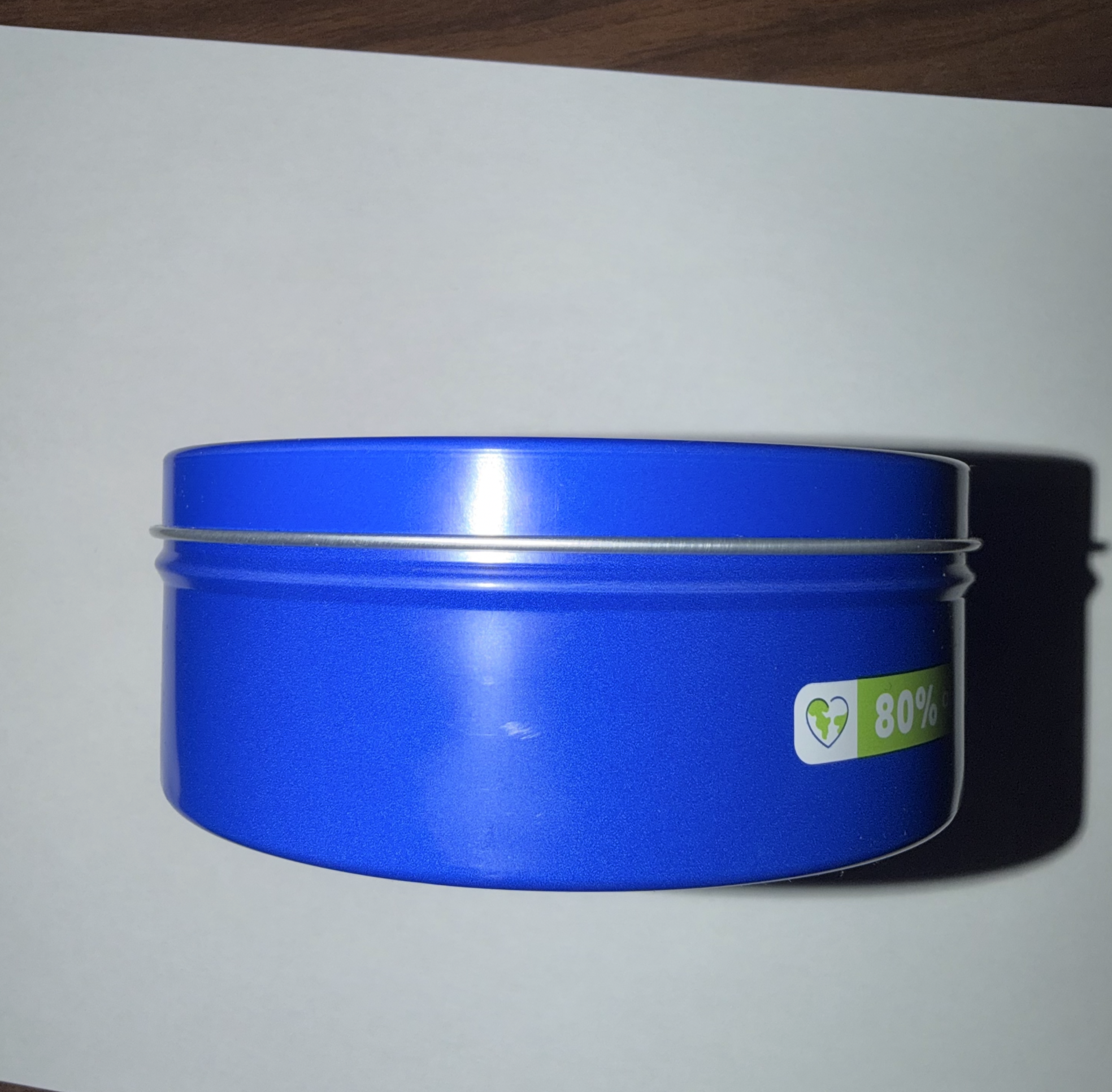 Nivea Cream in a Cylindical Container, side-facing.